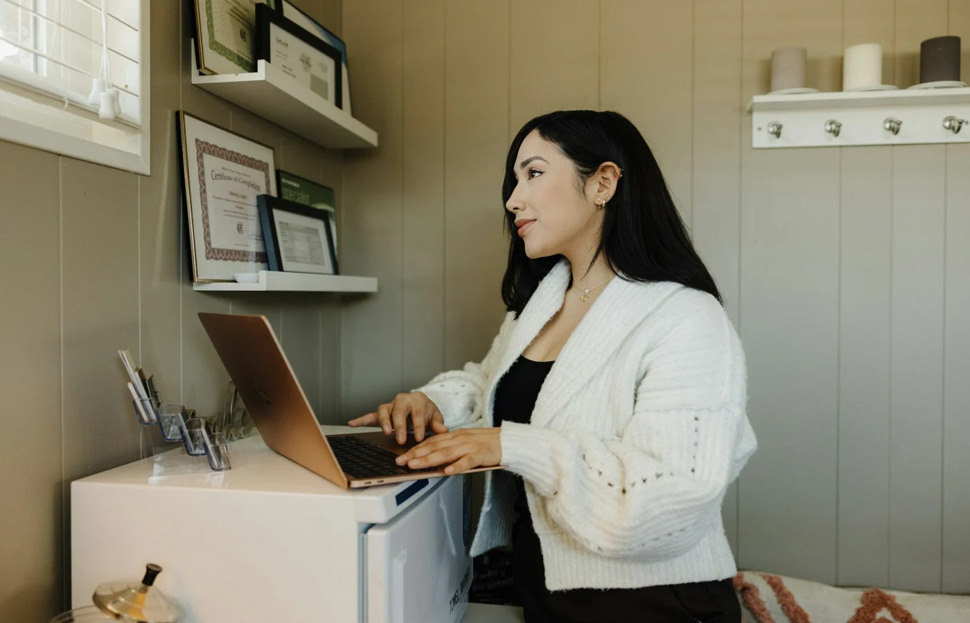 Business owner reviewing local search performance on laptop